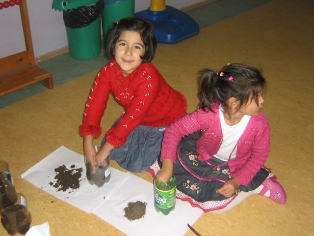 students planting mats.